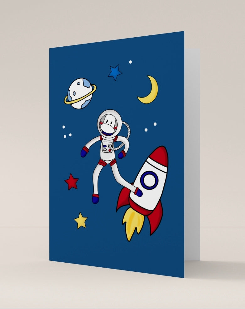 carte double pliée astronaute fusée planète étoile