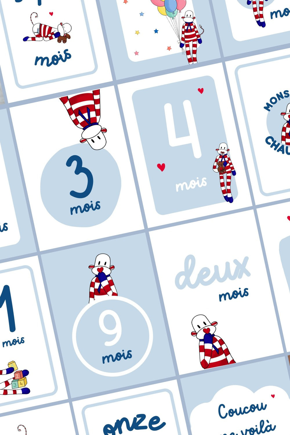 cartes étapes mois anniversaire de bébé allant de 0 à 12 mois avec petit singe à rayures rouges et blanches.